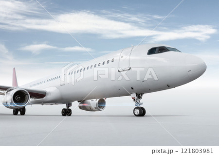 Close-up of passenger airplane isolated on bright background with sky Close-up of passenger airplane isolated on bright background with sky 121803981