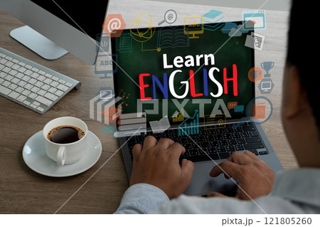Learn English on the screen man is typing on a laptop with the words on Pc Learn English on the screen man is typing on a laptop with the words on Pc 121805260