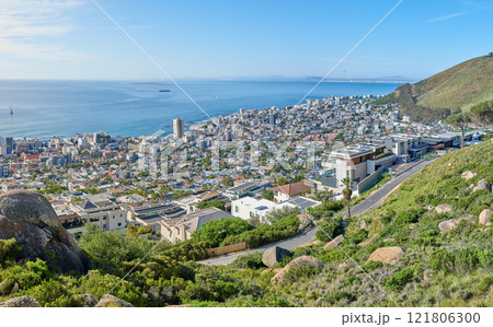 Panorama landscape view of the city Cape Town in South Africa. Beautiful scenic view of a popular tourist town with greenery and nature during summer. Ocean and residential in the Western Cape 121806300