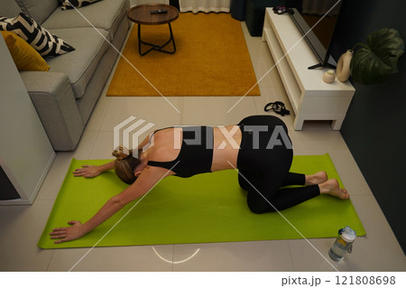 A young woman have a joyfully yoga practice  121808698