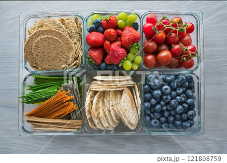 Colorful Healthy Foods in Container 121808759
