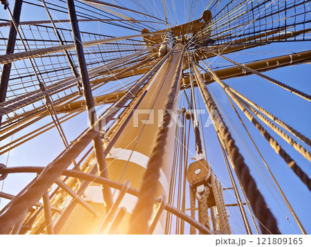Ropes stretched across the masts of an old ship Ropes stretched across the masts of an old ship 121809165