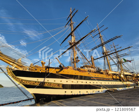 A large old ship at pier under a beautiful blue sky 121809567