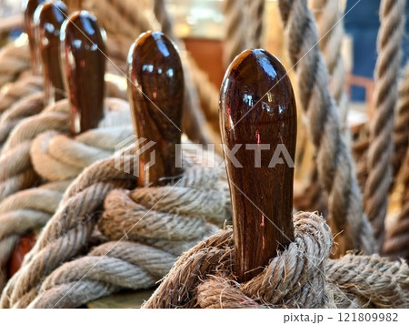 Ropes stretched across the masts of an old ship Ropes stretched across the masts of an old ship 121809982