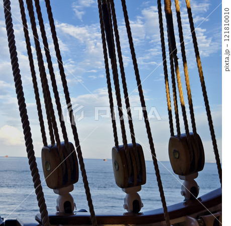 Ropes stretched across the masts of an old ship Ropes stretched across the masts of an old ship 121810010