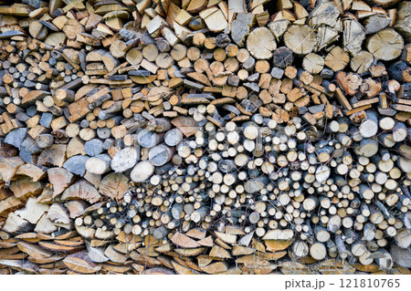 Pile of wooden logs for burning Pile of wooden logs for burning 121810765