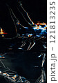 Glitch overlay. Creased film texture. Blue orange white color light flares artifacts dust scratch distressed uneven wrinkled foil defect dark illustration art abstract background. 121813235