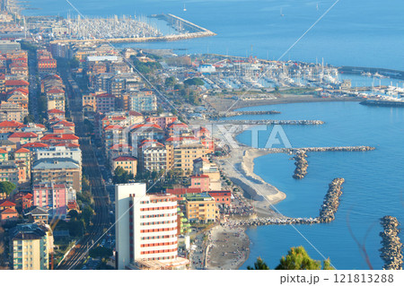 Chiavari, Italy - December 29, 2024. Resort town by sea. Tourism, marina, yachts and recreation. View from mountain on sunny day. Chiavari, Italy - December 29, 2024. Resort town by sea. Tourism, marina, yachts and recreation. View from mountain on sunny day. 121813288