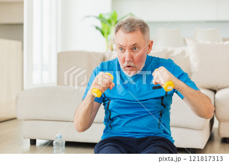Fitness workout training. Senior man boxing punching picking up dumbbells. Old adult mature healthy man doing sports exercise at home. Grandfather have workout rehabilitation. Health care healthy Fitness workout training. Senior man boxing punching picking up dumbbells. Old adult mature healthy man doing sports exercise at home. Grandfather have workout rehabilitation. Health care healthy 121817313