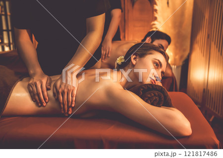 Caucasian couple customer enjoying relaxing anti-stress massage. Quiescent 121817486