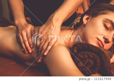 Caucasian woman customer enjoying relaxing anti-stress massage. Quiescent 121817499