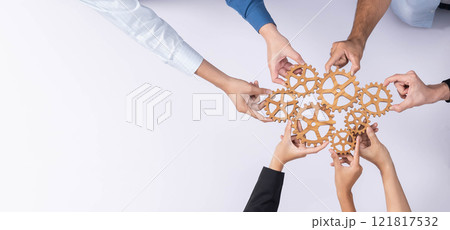 Business team joining cogwheel in circular together. Prudent Business team joining cogwheel in circular together. Prudent 121817532