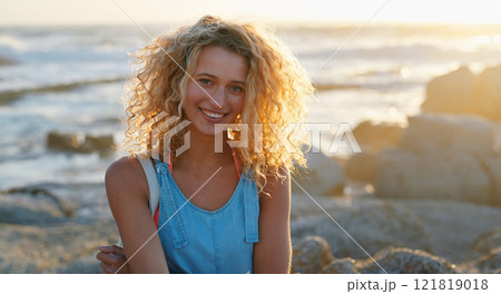 portrait attractive blonde woman on beach at sunset smiling enjoying summer travel lifestyle on vacation 121819018