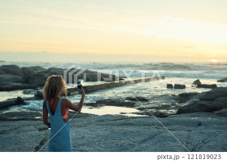 woman using taking photo using smartphone on beautiful beach at sunset sharing travel lifestyle photographing seaside with mobile phone camera woman using taking photo using smartphone on beautiful beach at sunset sharing travel lifestyle photographing seaside with mobile phone camera 121819023