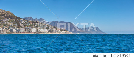 Sea Point and the Twelve Apostles with Table Mountain in the background during summer in Cape Town, South Africa. Scenic banner landscape views of the ocean against a clear blue sky for tourism Sea Point and the Twelve Apostles with Table Mountain in the background during summer in Cape Town, South Africa. Scenic banner landscape views of the ocean against a clear blue sky for tourism 121819506