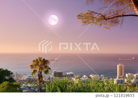 Beautiful landscape view of the sea and horizon from Signal Hill tourism location in Cape Town, South Africa. Stunning city and ocean with a full moon in a sunset sky background with copy space. 121819655