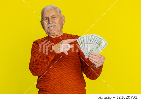 Rich happy senior man winner waving money dollar cash like a fan, big income wealth success business Rich happy senior man winner waving money dollar cash like a fan, big income wealth success business 121820732