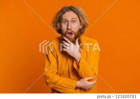 Excited amazed man surprise looking at camera with big eyes shocked by sudden victory wow emotion 121820781
