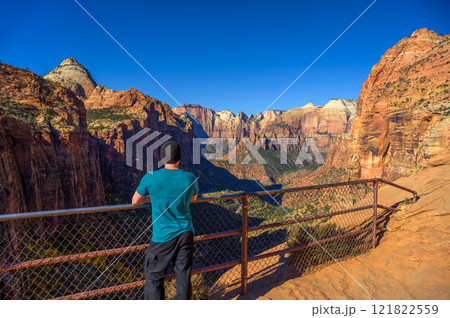 Tourist at Canyon Overlook in Zion National Park, Utah 121822559