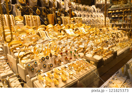 Bracelets on a show window jewelry store, turkish gold shop 121825373