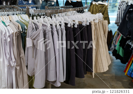 Stylish shorts display invites shoppers to explore trendy summer fashion 121826331