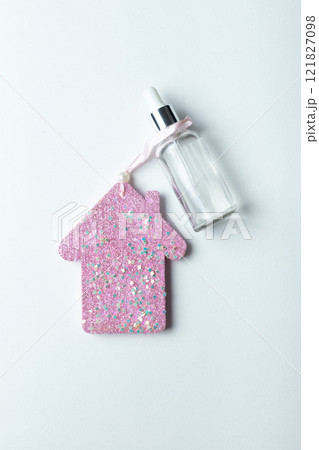 face serum with pink sequin house face serum with pink sequin house 121827098
