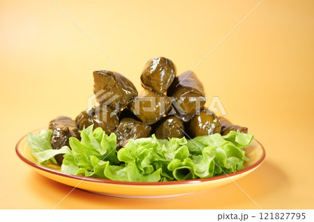 Traditional dolma grape leaves on a plate  121827795