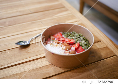 Enjoy a Healthy Bowl with Strawberries and Pumpkin Seeds for any meal Enjoy a Healthy Bowl with Strawberries and Pumpkin Seeds for any meal 121827901