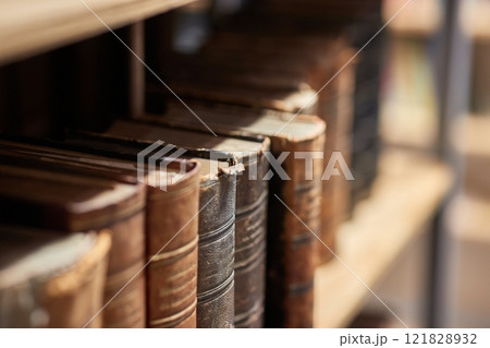 Old books in a library Old books in a library 121828932