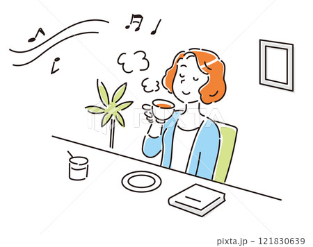 カフェで音楽を聞きながらお茶を飲んでリラックスしている若い女性 121830639