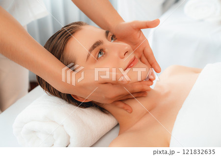 Caucasian woman enjoying relaxing anti-stress head massage. Quiescent 121832635