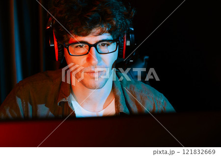 Streamer concentrated with Esport team on computer with harder game. Gusher. Streamer concentrated with Esport team on computer with harder game. Gusher. 121832669
