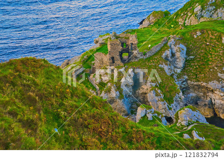 Kinbane Castle in Northern Ireland - The magnificent ruins of an ancient coastal structure provide Kinbane Castle in Northern Ireland - The magnificent ruins of an ancient coastal structure provide 121832794