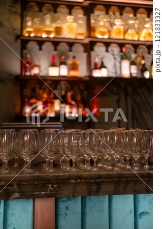Drinking glasses prepared on the counter bar Drinking glasses prepared on the counter bar 121833327