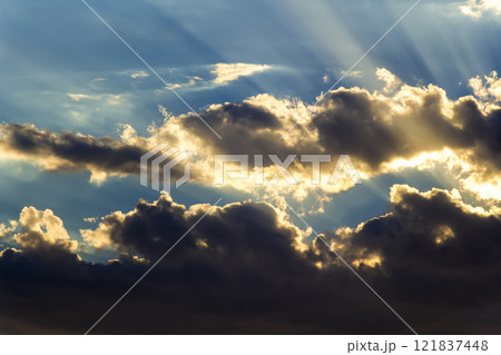 The sun is behind the clouds 121837448