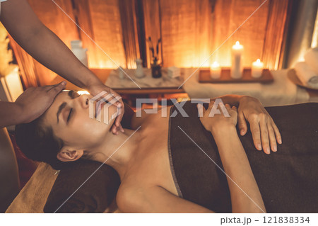 Caucasian woman enjoying relaxing anti-stress head massage. Quiescent 121838334