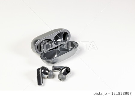 Luxury bluetooth Wireless earphone or earbud or headphone with charge case isolated on white background. 121838997