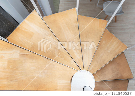 Spiral steel staircase circular staircase decoration interior. travel and architecture background.spiral staircase dark color 121840527