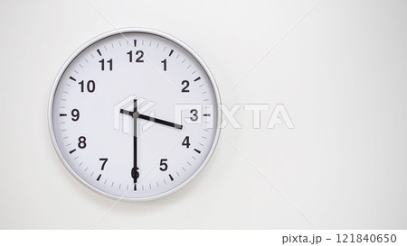 Minimalist White Clock with Silver Frame Striking 15.30/03.30 on White Background. Perfect for Time Management and Corporate Campaigns Minimalist White Clock with Silver Frame Striking 15.30/03.30 on White Background. Perfect for Time Management and Corporate Campaigns 121840650