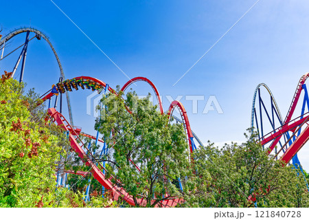 Roller Coaster in funny amusement park. Roller Coaster in funny amusement park. 121840728