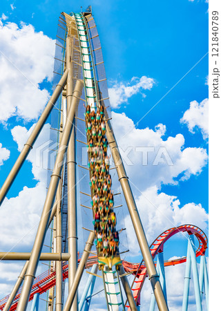 Roller Coaster in funny amusement park. Roller Coaster in funny amusement park. 121840789