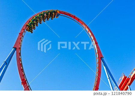 Roller Coaster in funny amusement park. Roller Coaster in funny amusement park. 121840790
