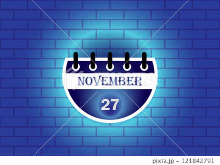 November 27th calendar date displayed on a blue brick wall background. Perfect for scheduling, reminders, or event planning. 121842791