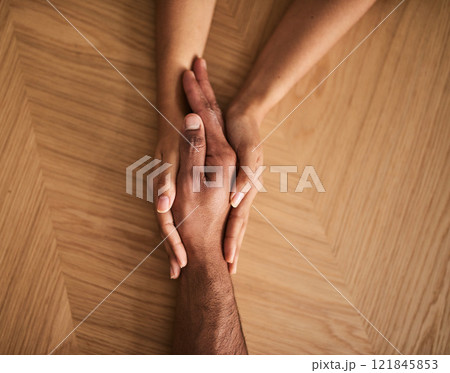 Care, kindness, support with two people holding hands while sitting and talking together. Above affectionate couple, showing trust and forgiveness while bonding and discussing their relationship Care, kindness, support with two people holding hands while sitting and talking together. Above affectionate couple, showing trust and forgiveness while bonding and discussing their relationship 121845853