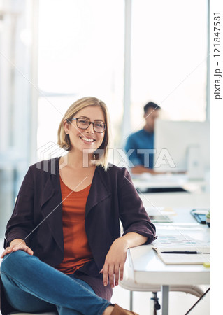 Confident and smiling businesswoman, executive or corporate leader with success, leadership and confidence in a work office. Face portrait of a smart creative research analyst, manager or boss Confident and smiling businesswoman, executive or corporate leader with success, leadership and confidence in a work office. Face portrait of a smart creative research analyst, manager or boss 121847581