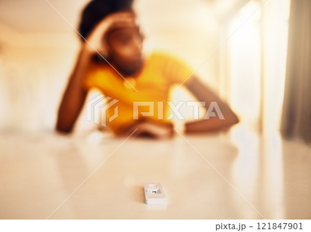 Testing for covid, coronavirus or infection with a rapid antigen test kit at home. Closeup of a worried woman waiting for the result of a screening test to diagnose an illness, sickness or infection Testing for covid, coronavirus or infection with a rapid antigen test kit at home. Closeup of a worried woman waiting for the result of a screening test to diagnose an illness, sickness or infection 121847901
