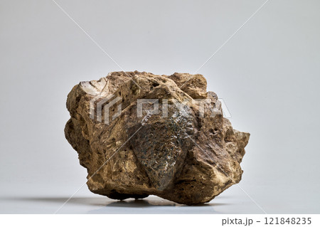 Close-Up Of a big Rock Against White Background Close-Up Of a big Rock Against White Background 121848235