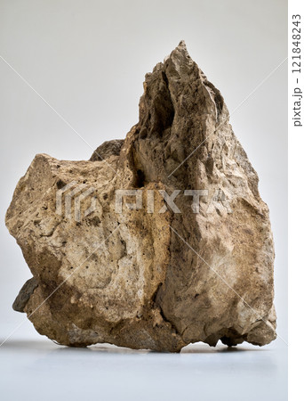 Close-Up Of a big Rock Against White Background 121848243