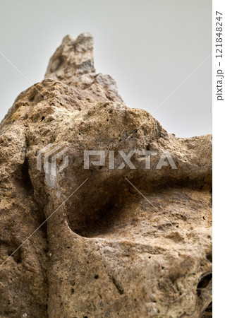 Close-Up Of a big Rock Against White Background Close-Up Of a big Rock Against White Background 121848247