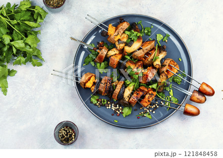 Sweet potato with mushrooms on skewers. Sweet potato with mushrooms on skewers. 121848458
